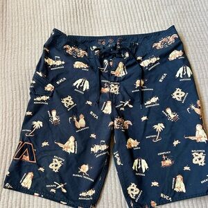 black RVCA boardshorts with graphic print